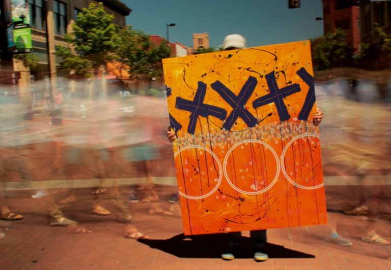 wall of blurred folks scaled 768x532